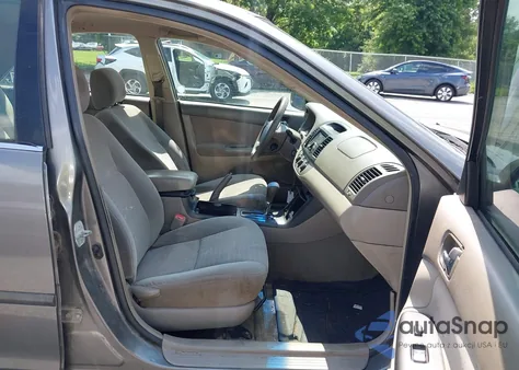 2006 Toyota Camry Le from USA, damaged, VIN 4T1BE32K66U659871